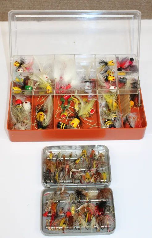 Fishing Poppers and Flies in Cases