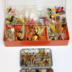 Fishing Poppers and Flies in Cases