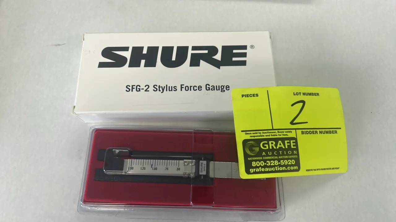 Shure SFG-2 stylus force gauge. Features a precision balance beam scale calibrated for measuring turntable phono cartridge tracking force. Includes pr