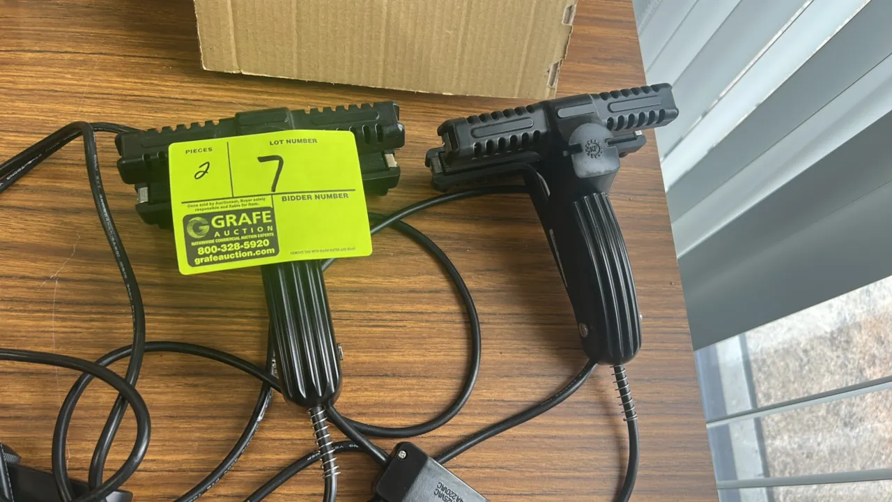 Uline H-1069 handheld crimp heat sealers. Features direct heat serrated sealing jaws, inline temperature control switch, and ergonomic grip handles. S