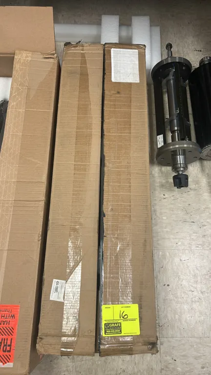 Kodak NexPress S3000 digital production press components. Includes replacement parts and assemblies packed in protective foam-lined boxes, along with