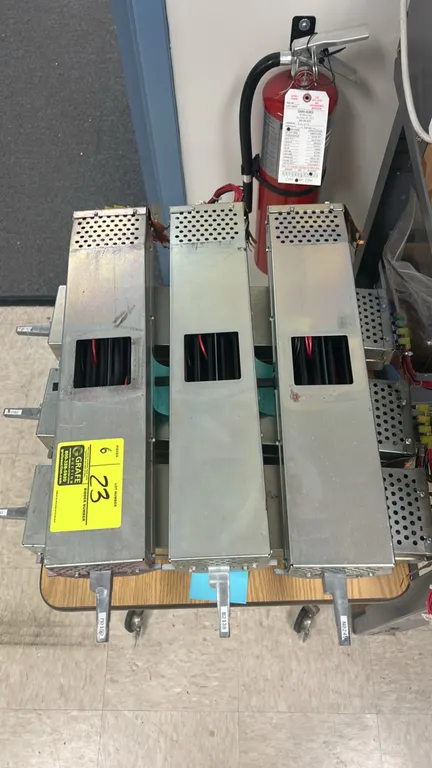 Kodak NexPress 2100 digital production components. Features metal modular enclosures with perforated ventilation, slide-out handles, and integrated wi