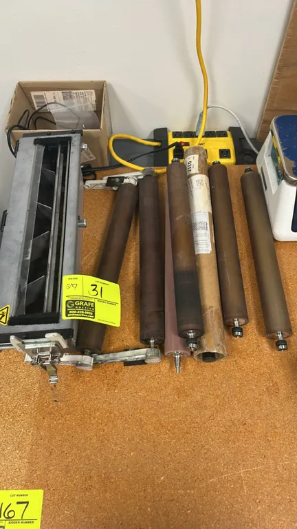 Kodak NexPress S3000 digital production color press components. Package includes a module housing assembly and assorted press rollers.
