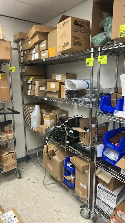 Stainless steel multi-tier portable wire shelving rack. Features (4) wire shelves. 72" x 18". Mounted on swivel casters. Contents not included.