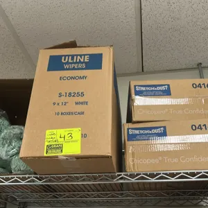 Quantity of mop heads,Webril handi-pads,poly bowls and lids,Glass jars and remaining contents on rack