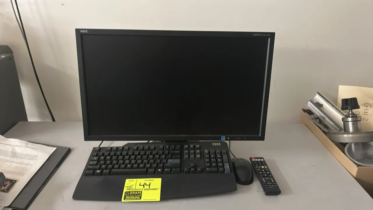 NEC 24" computer monitor workstation package. Includes an NEC MultiSync monitor, Dell computer tower, IBM keyboard, IBM mouse, and remote control. Equ