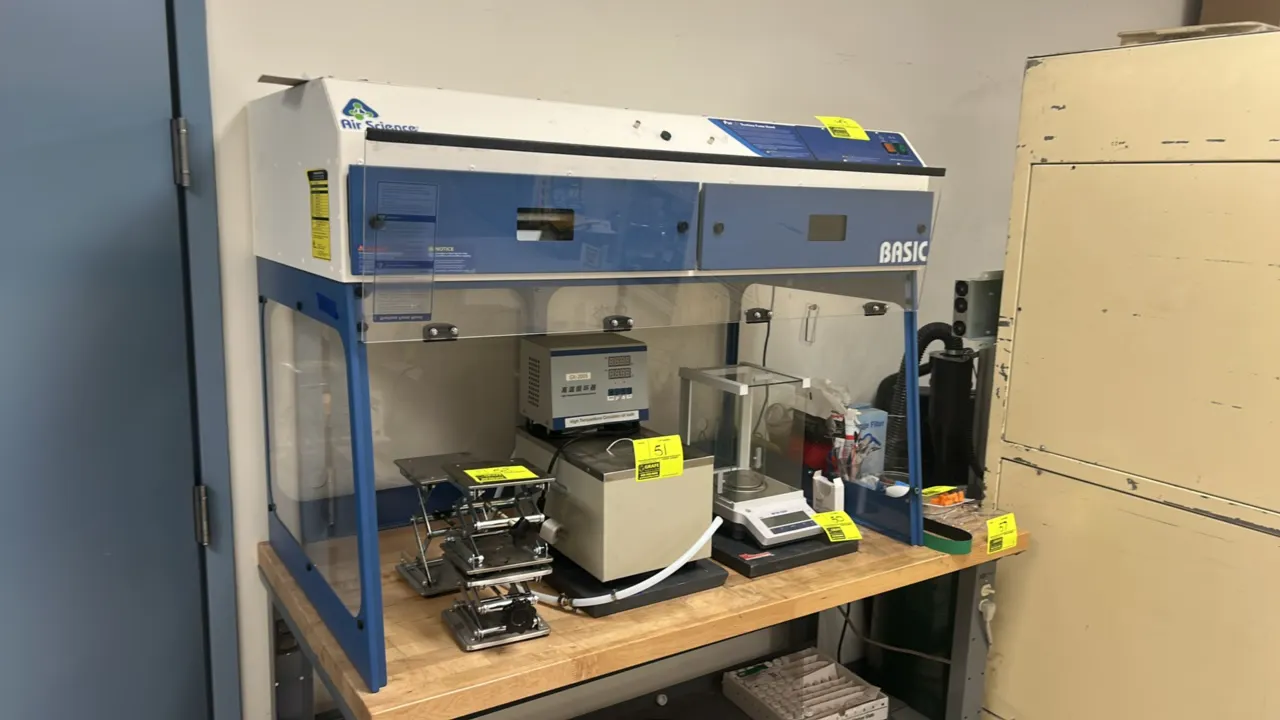 Air Science Purair Basic ductless fume hood. Features clear side panels, hinged front sash, top filtration housing, and integrated control panel. Cont