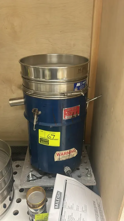 Vorti-Siv RB-F12 sieving and straining machine. Features stainless steel contact parts, U.S.A. Standard Test Sieve No. 140, quick-release ring clamp,