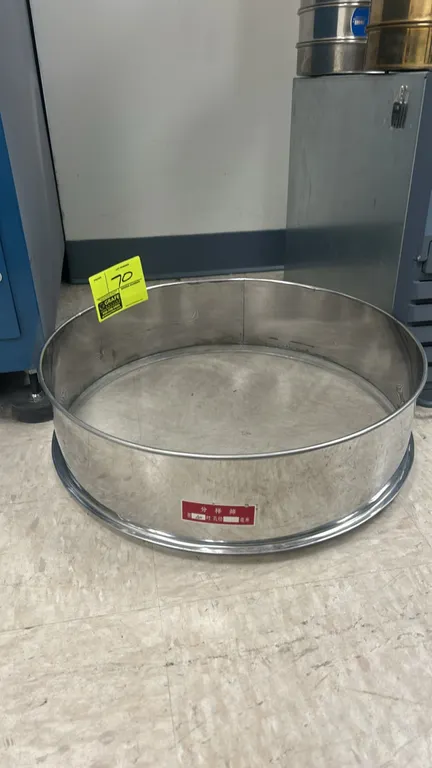 Stainless steel round test sieve. Features fine wire mesh screen and nesting bottom rim.