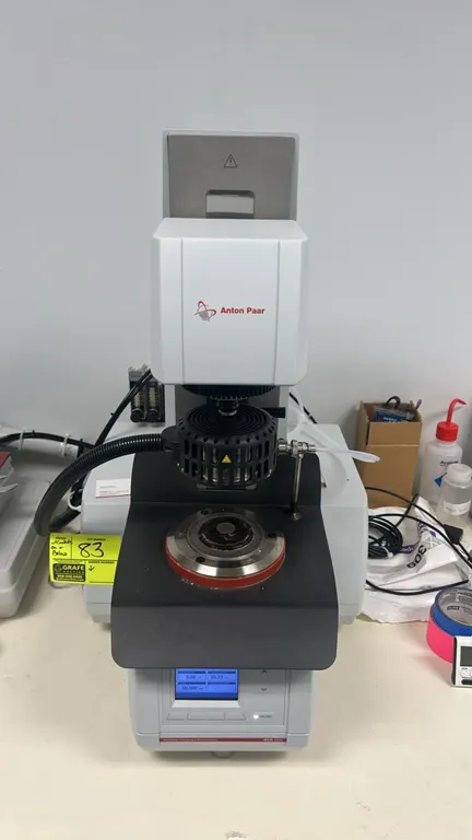 Anton Paar MCR 302e Modular Compact Rheometer. Features digital display, temperature-controlled measuring assembly, and quick-connect mount. Includes