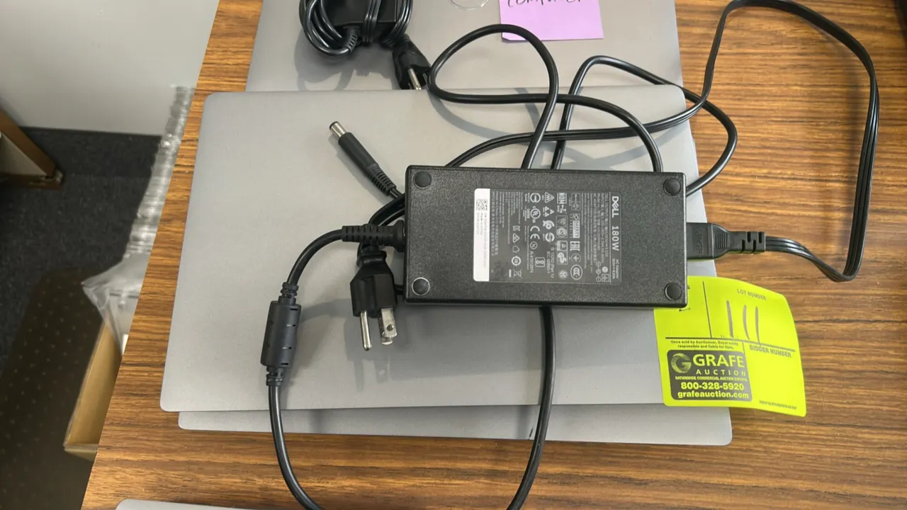 2022 Dell P137G 13" laptops, Dell Outlet refurbished. Features integrated webcams, trackpads, and Intel Core processors. Includes AC power adapters. I