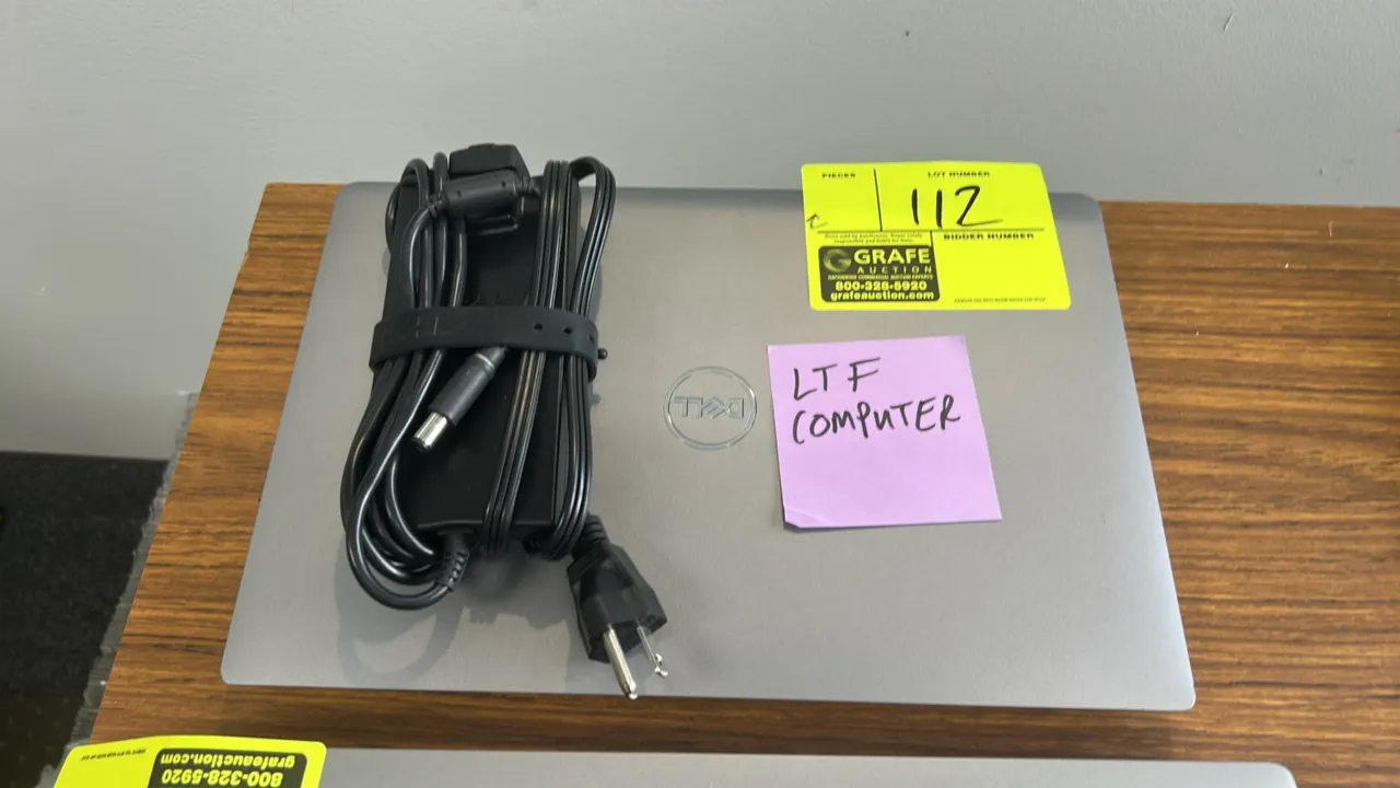 2021 Dell P137G 13" laptop computer, Dell Outlet refurbished. Features integrated webcam, keyboard, touchpad, and Intel Core processor. Includes AC po