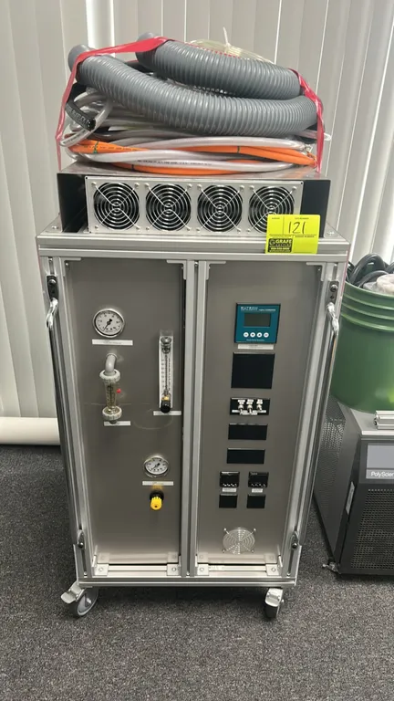Eutech Instruments alpha COND560 conductivity controller integrated into a mobile coolant filtration and conditioning system cart. Features aluminum e