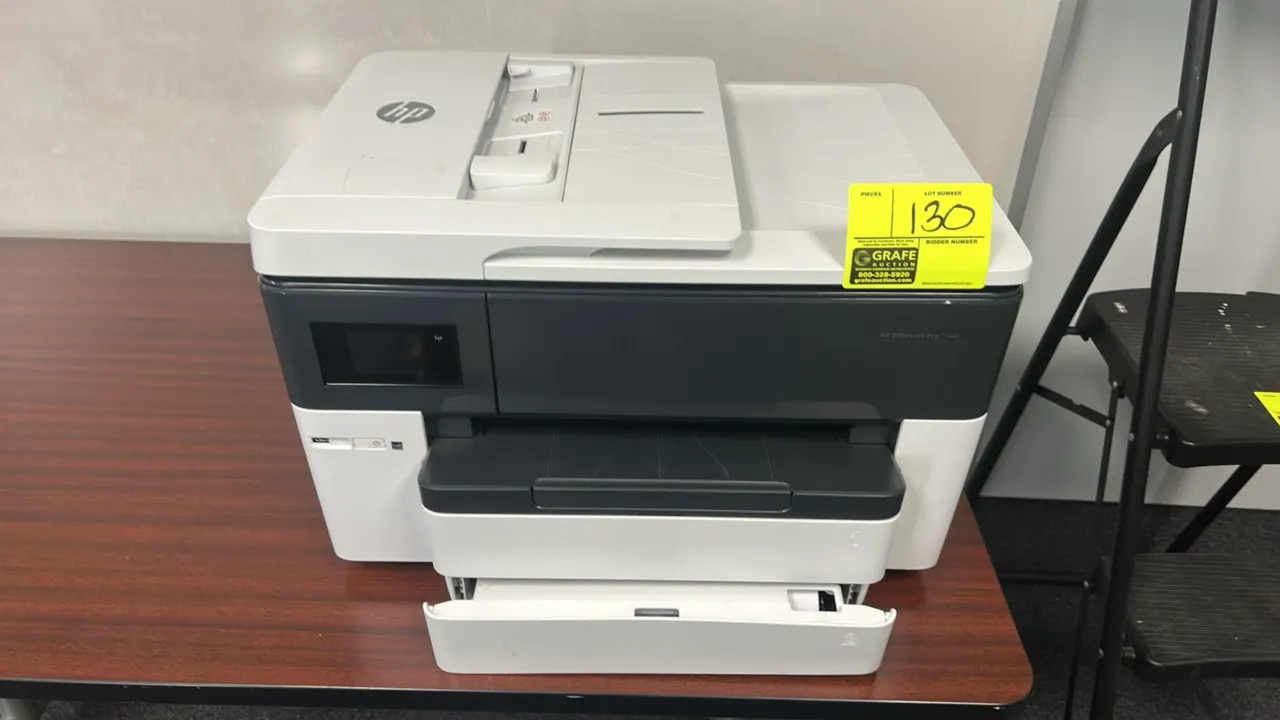 HP OfficeJet Pro 7740 wide format all-in-one printer. Features print, fax, scan, and copy functions, automatic document feeder, color touchscreen disp