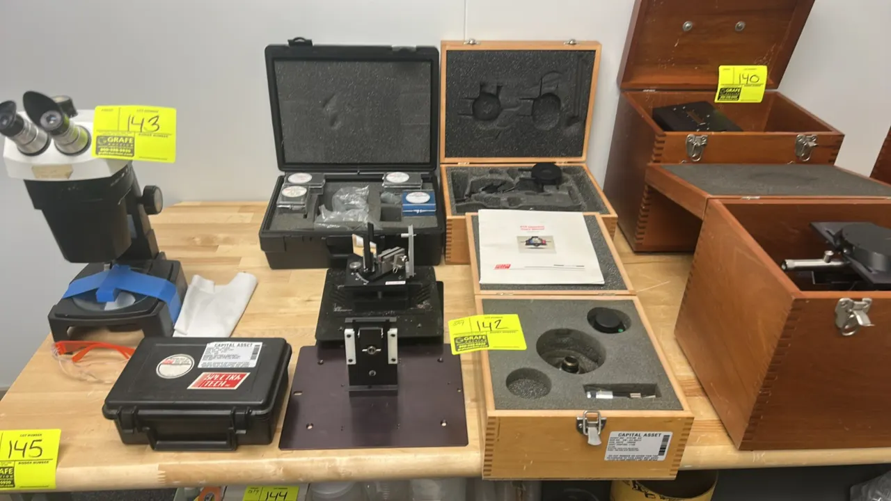 Spectra-Tech FTIR spectrometer accessories lot. Includes Model 300 continuously variable angle ATR accessory, diamond cell accessory with case, and AT