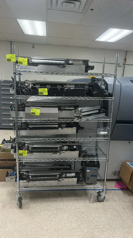 Stainless steel multi-tier portable wire rack. Features (6) adjustable wire shelves. 48"W x 18"D. Mounted on swivel casters. Contents not included.