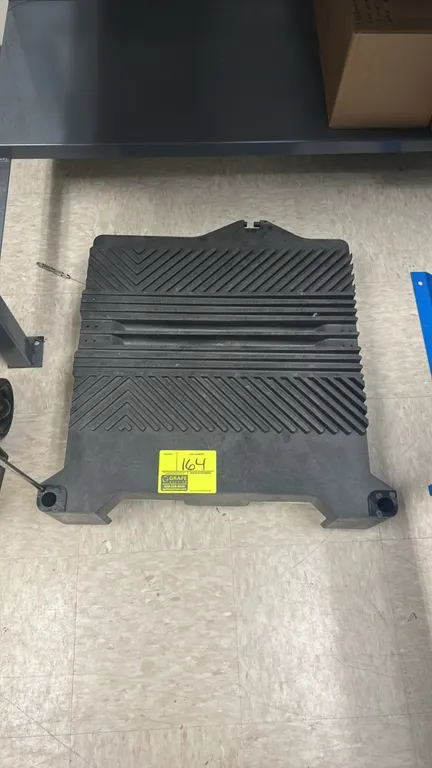 Poly portable platform. Features molded polyethylene construction with a textured non-slip tread surface and corner receiver sockets. Includes metal u