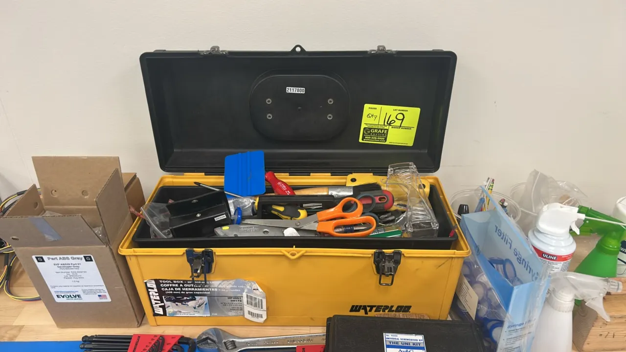 Waterloo HP2051 20" portable tool box with contents. Features polypropylene construction, dual metal latches, and removable interior organizer tray. I