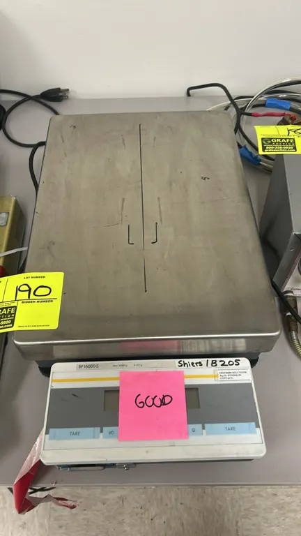 Sartorius BP 16000-S top-loading laboratory balance. Features a stainless steel weighing platform, digital display terminal, and push-button tare cont