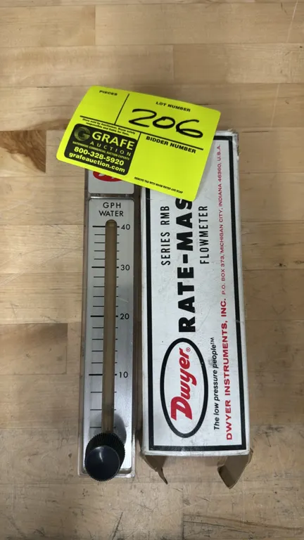 Dwyer Series RMB Rate-Master flowmeter. Features direct-reading scale for water calibrated up to 40 GPH and integrated flow control valve. Includes or