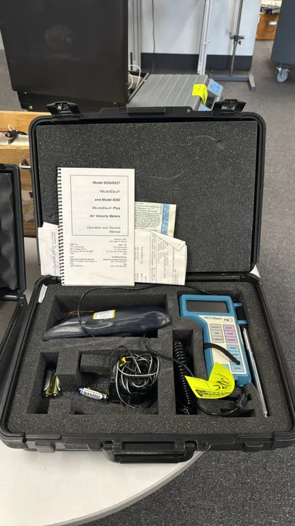 TSI VelociCalc 8355 air velocity meter. Includes telescoping probe, operation and service manual, and hard-shell carrying case with custom foam insert
