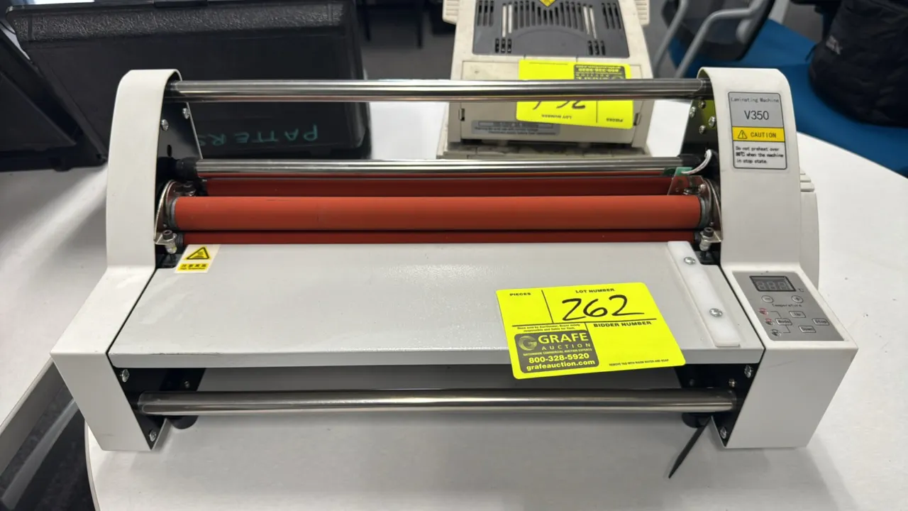 V350 roll laminating machine. Features 14 1/2" width capacity, dual silicone rollers, and digital control panel with temperature display.