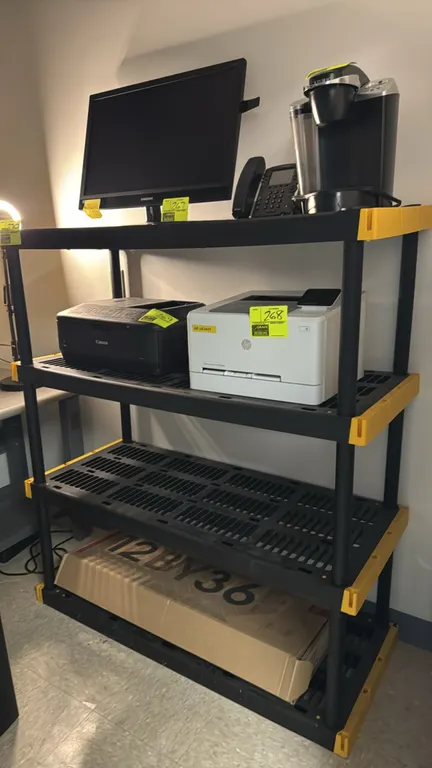 4-tier poly shelving rack. Features ventilated plastic shelves with yellow corner accents. 48"W x 20"D x 54"H. Contents not included.