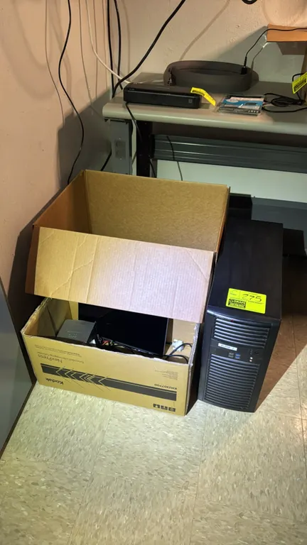 Supermicro tower workstation computer with assorted computer accessories and cables. Features dual CPU coolers, expansion cards, front panel USB ports