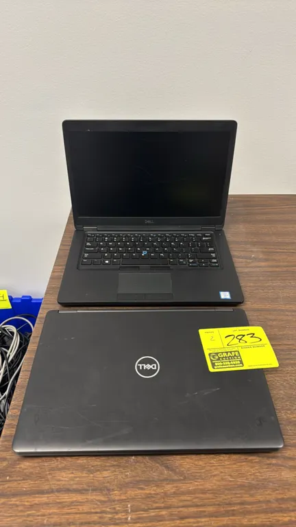 2018 Dell Latitude 5491 laptops. Features 14" display, integrated webcam, keyboard with center track stick, and touchpad. Electrical: 19.5V. Note: Pow