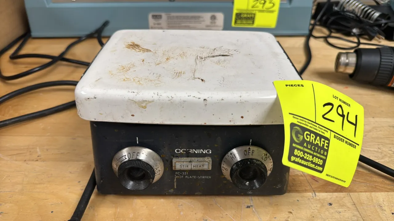 Corning PC-351 hot plate-stirrer. Features ceramic top surface, independent analog dial controls for stir speed and heat settings, and indicator light