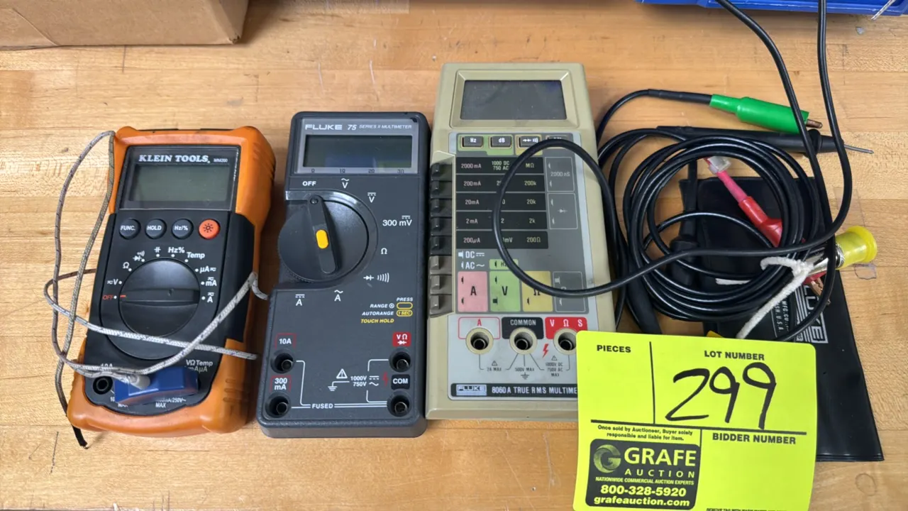 Klein Tools and Fluke digital multimeters. Includes Klein Tools MM200 with temperature probe, Fluke 75 Series II, and Fluke 8060A True RMS multimeter.