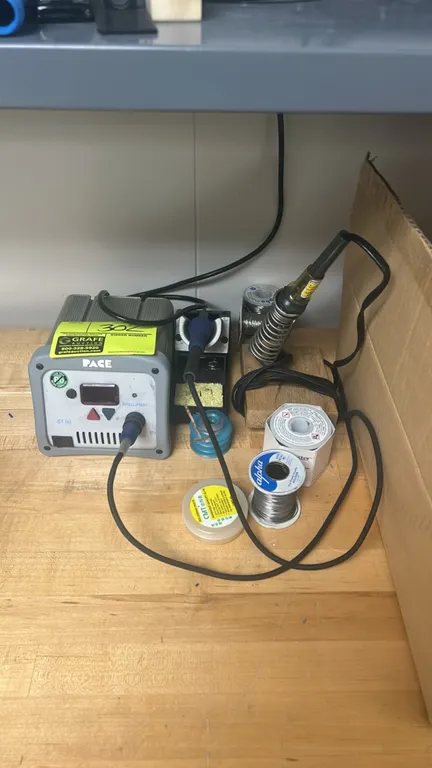 Pace ST 50 IntelliHeat digital soldering station. Features digital display, push-button temperature controls, and lead-free compatibility. Includes co