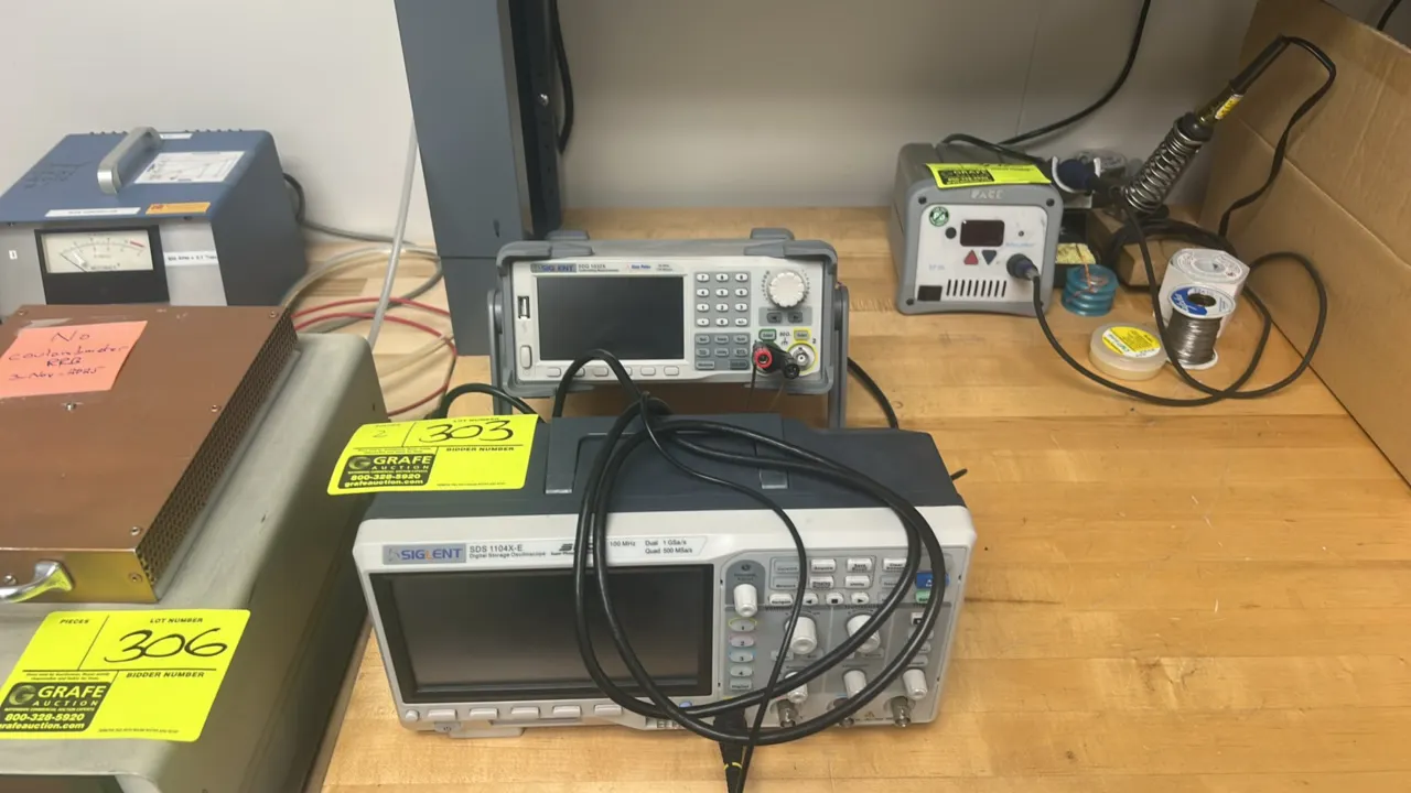 Siglent benchtop test equipment. Includes SDS1104X-E 4-channel 100 MHz digital storage oscilloscope and SDG1032X 30 MHz function/arbitrary waveform ge