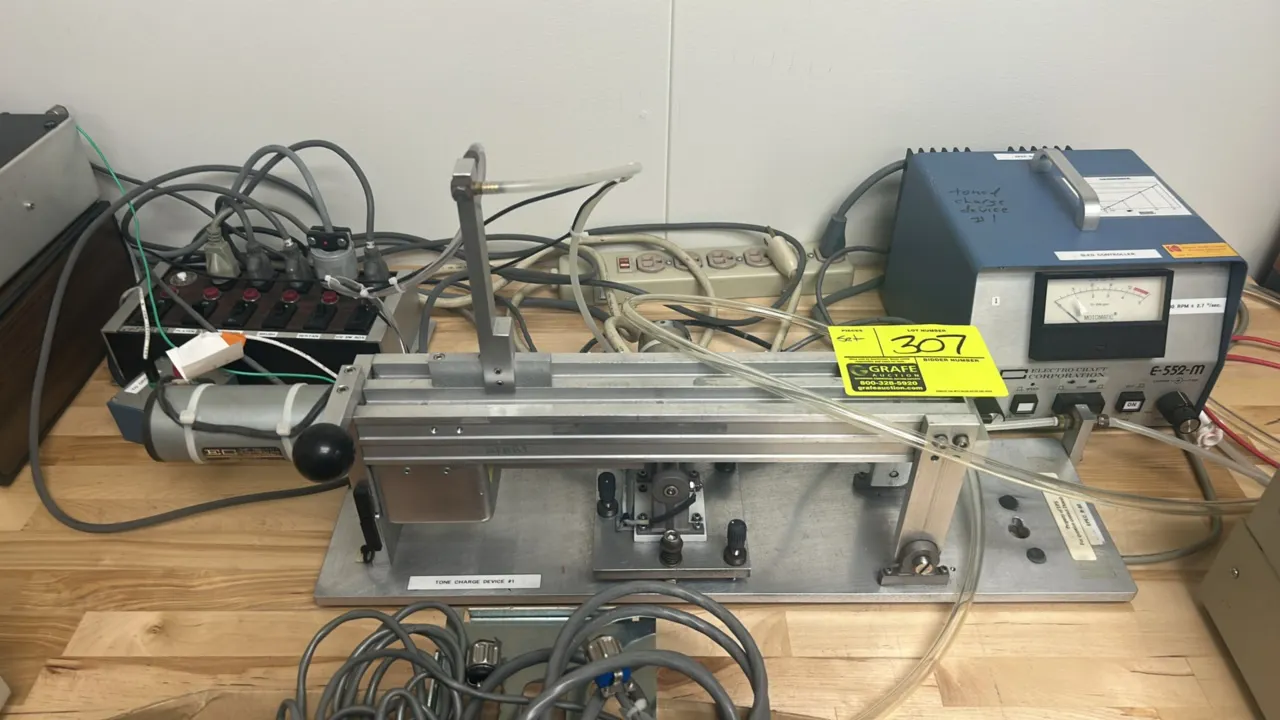 Custom industrial test fixture with Bertan Associates 205A-01R high voltage power supply and Electro-Craft Corporation E-552-M Motomatic speed control