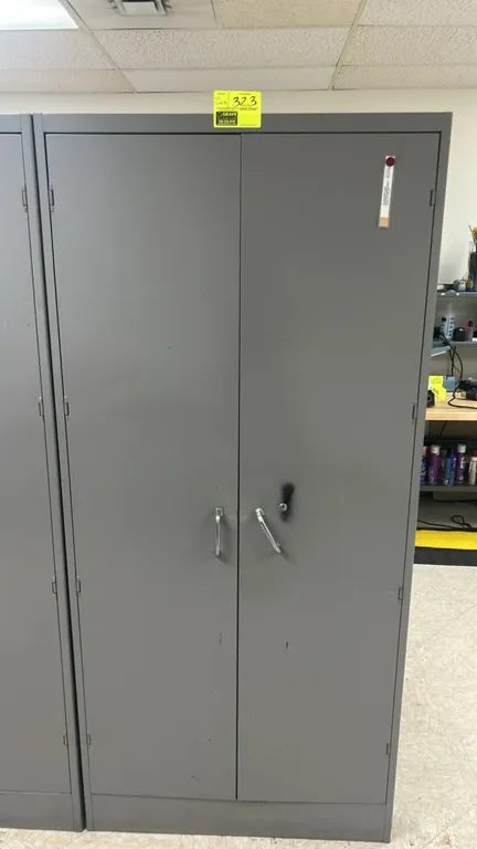 Metal 2-door locking cabinet with contents. Includes Keithley 616 digital electrometer, Electro-Craft Motomatic E-552-M motor controller, Omega DP80 s