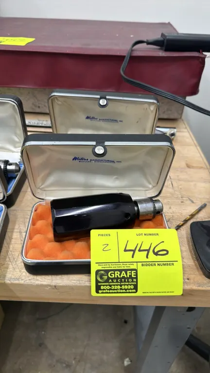Waters torque watch gauges. Features keyed chucks for bidirectional torque measurement. Includes fitted hard cases, chuck key, and operating instructi