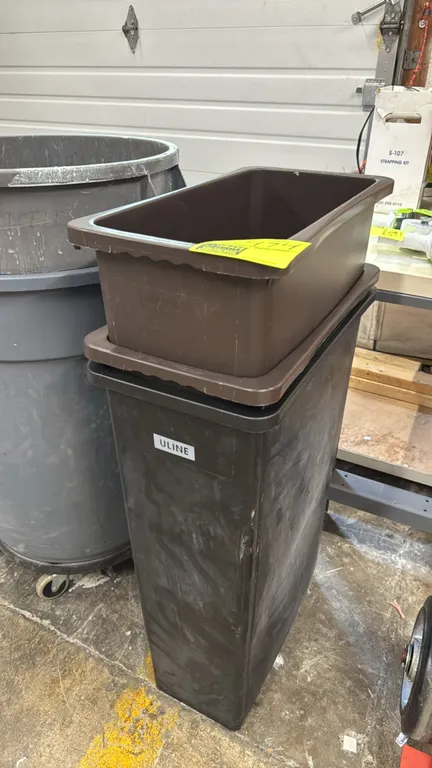 Rubbermaid 3540 Slim Jim polyethylene waste containers. Features a slim rectangular profile and molded plastic construction.