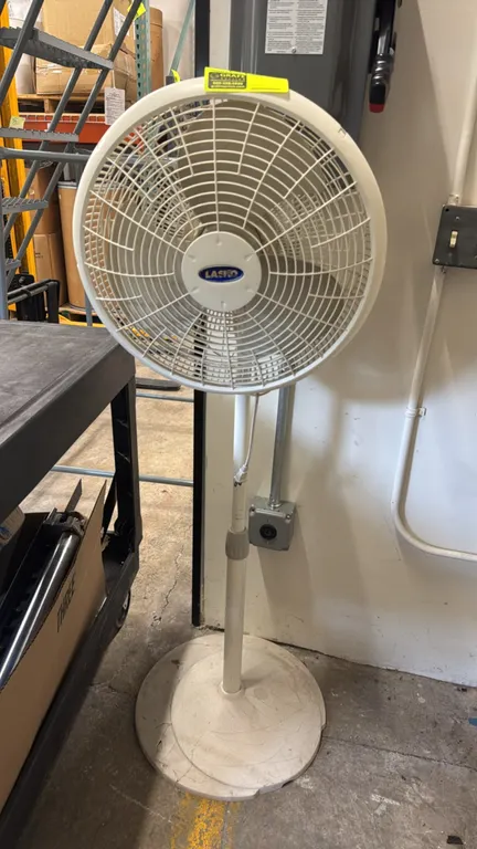 Lasko 16" poly pedestal fan. Features adjustable-height pole, plastic safety grille, and molded round pedestal base.