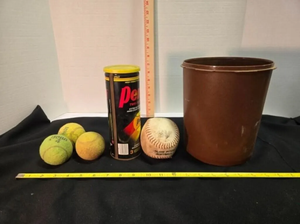 26 golf balls, 6 tennis balls, softball