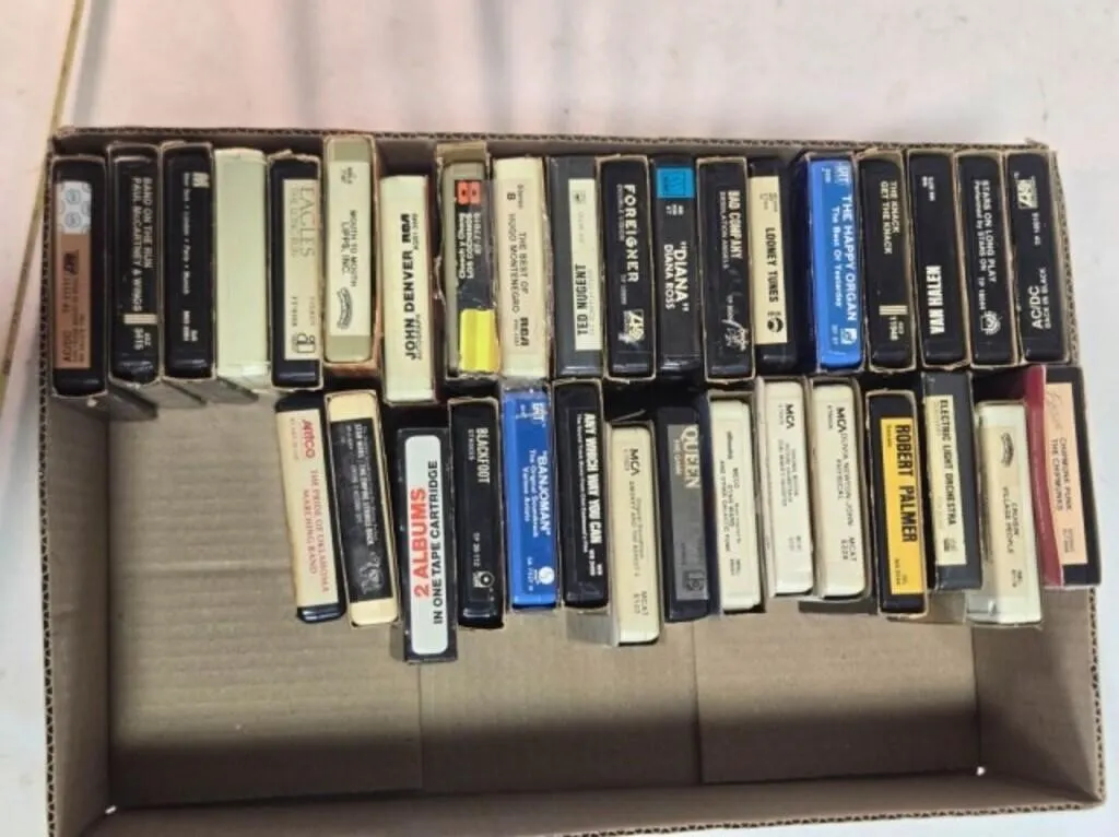 34 vintage rock & assorted 8 track tapes
