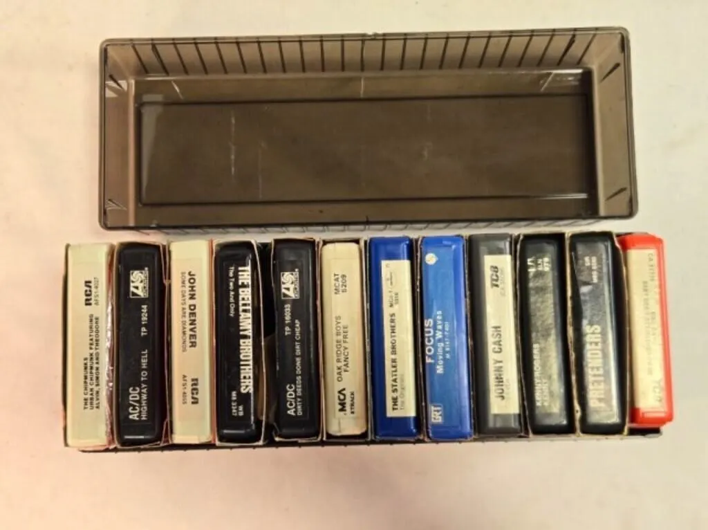 12 8-track tapes in plastic case