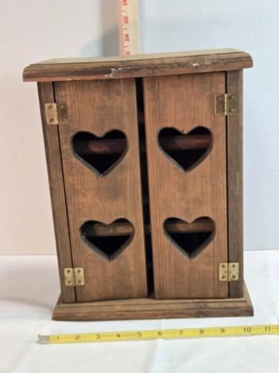 Wooden cabinet w/3 shelves, heart cutouts on doors