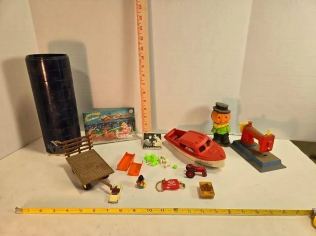 Farm toys, Santa, boat, sewing machine, stamp