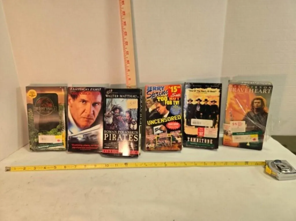 7 VHS tapes;' Braveheart (double), Tombstone