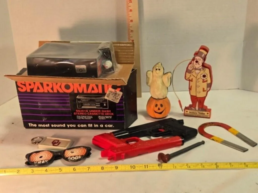 Under dash stereio cassette deck, pop guns, magnet