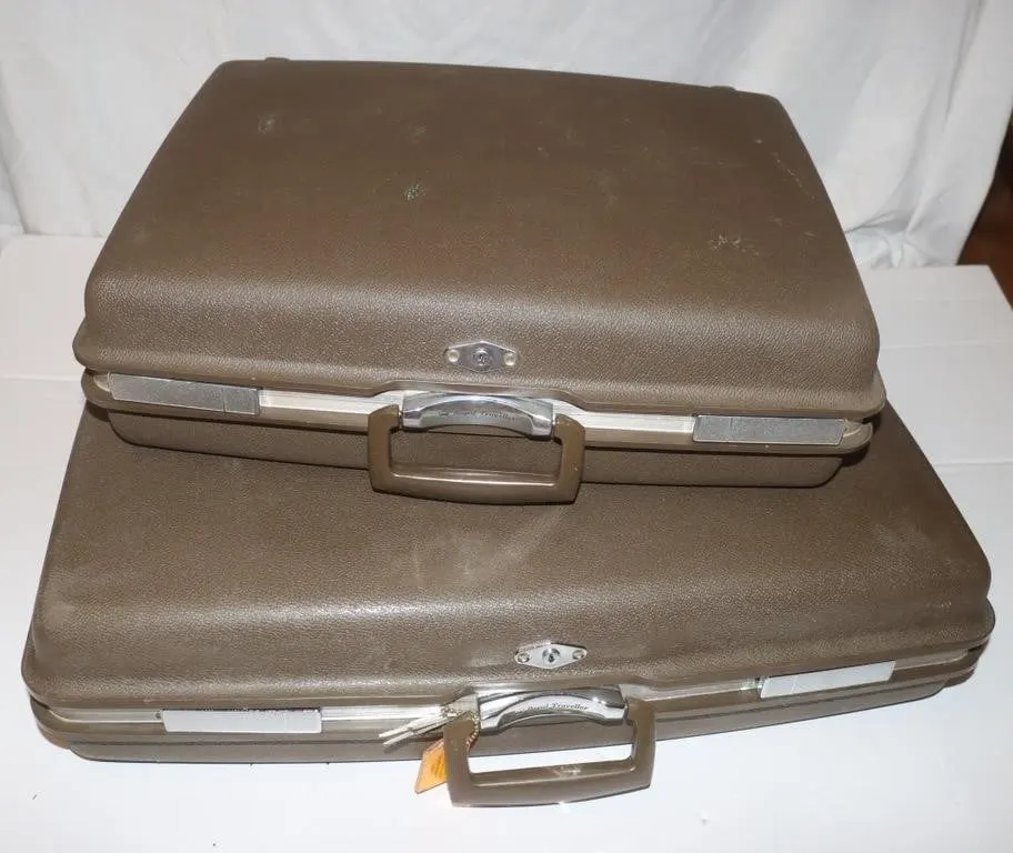 2 Royal Traveller Aurora Suitcases;