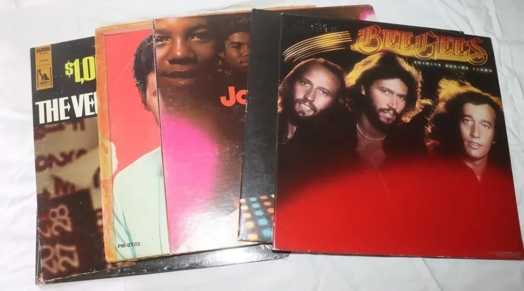 8 Vinyl Records:
