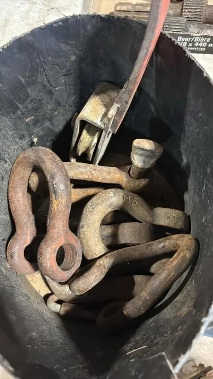Bucket of Asst. Clevis Hooks.