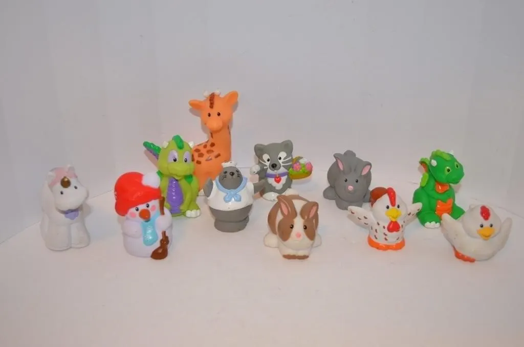 Assorted Fisher-Price Little People toy figures