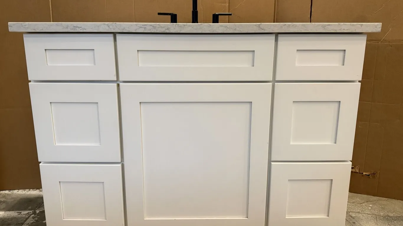 Wellborn 47" six-drawer vanity with Quartz top, sink, and faucet MSRP $2,100 - Used, excellent condition - see pics